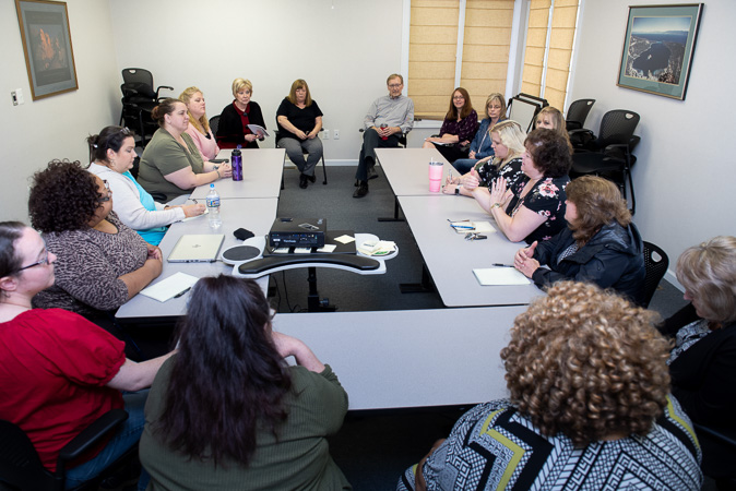 photograph of CSC in a meeting