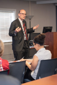 photograph of Carl Brun leading a session