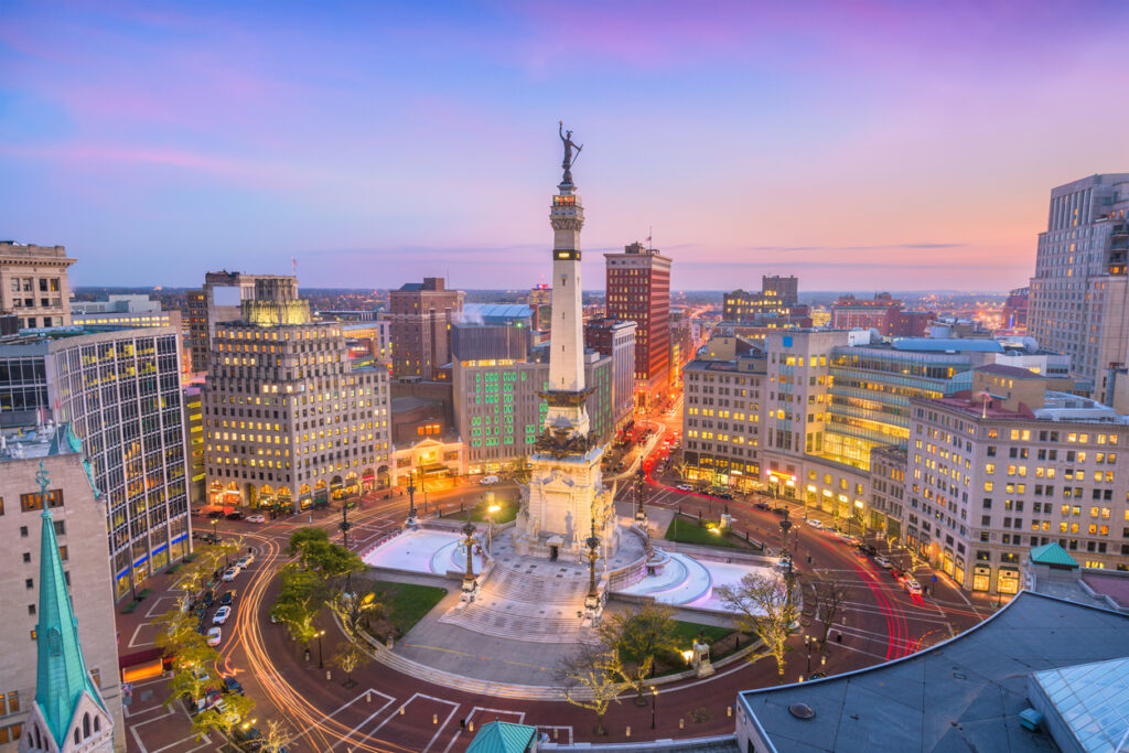 Indianapolis, Indiana, USA skyline over Soliders' and Sailors' Monument at dusk.