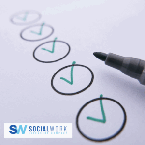 A photograph of a check list with all of the boxes checked. There is a pen on the right side and a Social Work Licensure Compact logo on the bottom left.